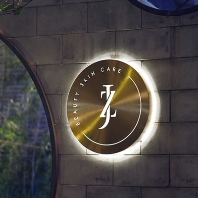 L'acier inoxydable en métal autour du logo fait sur commande mené 3d de caisson lumineux a illuminé