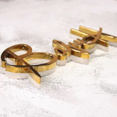 Les affaires Logo Signage Stainless Steel Lighted de miroir d'or stockent les signes avant