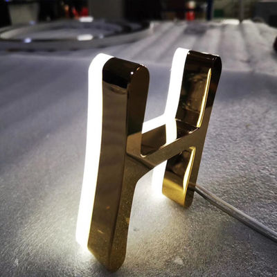 Les affaires Logo Signage Stainless Steel Lighted de miroir d'or stockent les signes avant